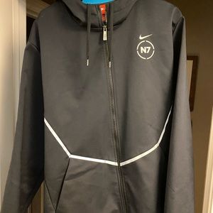 Nike Jacket, black with warm lining. Size X-Large